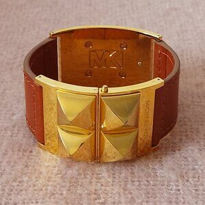 Michael Kors Bracelet, Wide Cuff with Leather and Gold Tone Pyramid-Shaped Studs